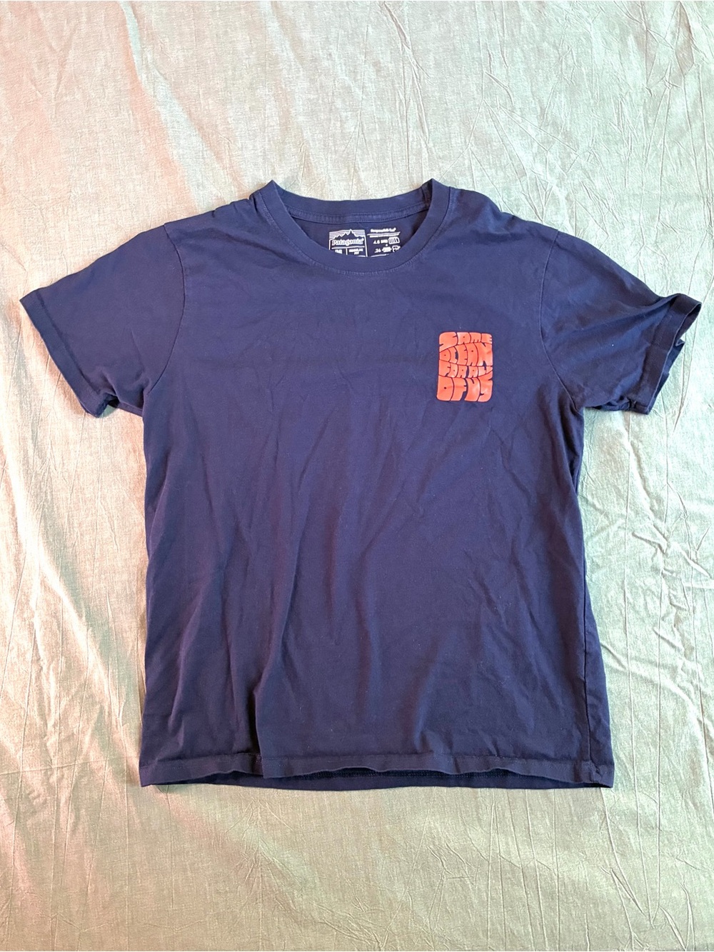 Limited Edition Patagonia Navy Responsibili-Tee “Same Ocean” Women’s Size M